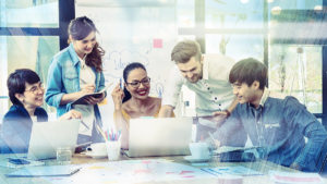 TLC - Co-workers taking part in a brainstorming session