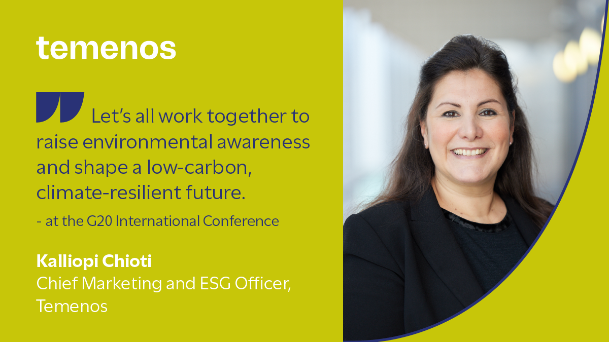 Smiling woman in a black suit against a blurred background. Quote discusses working together for environmental awareness and a low-carbon future. 