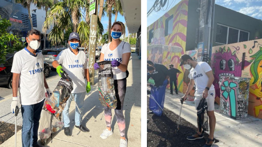 People in "Temenos" shirts pick up litter on a sunny street. They're using grabbers and wearing masks. Bright murals add a vibrant backdrop.