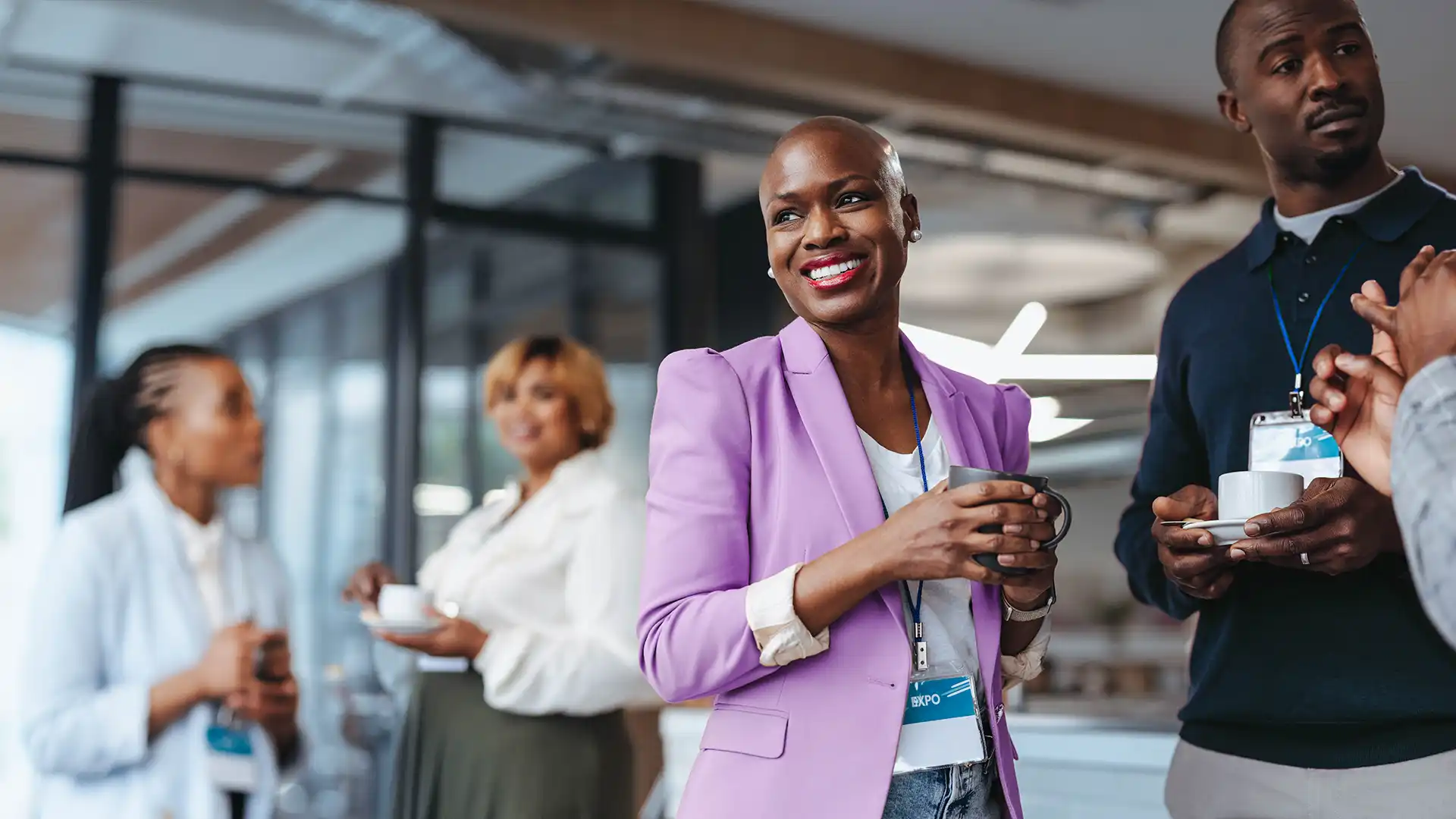 Woman standing with group looking to her left