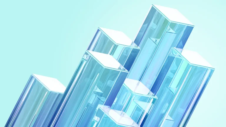 Glass columns growing towards top right of picture on teal background