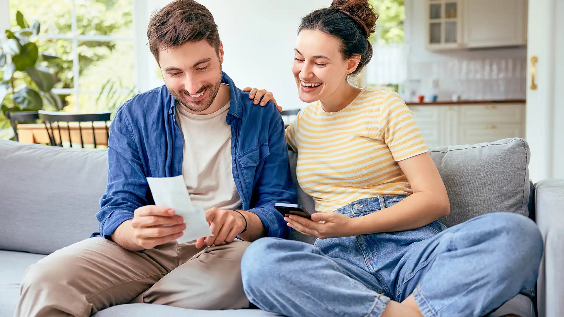 Couple looking at receipt