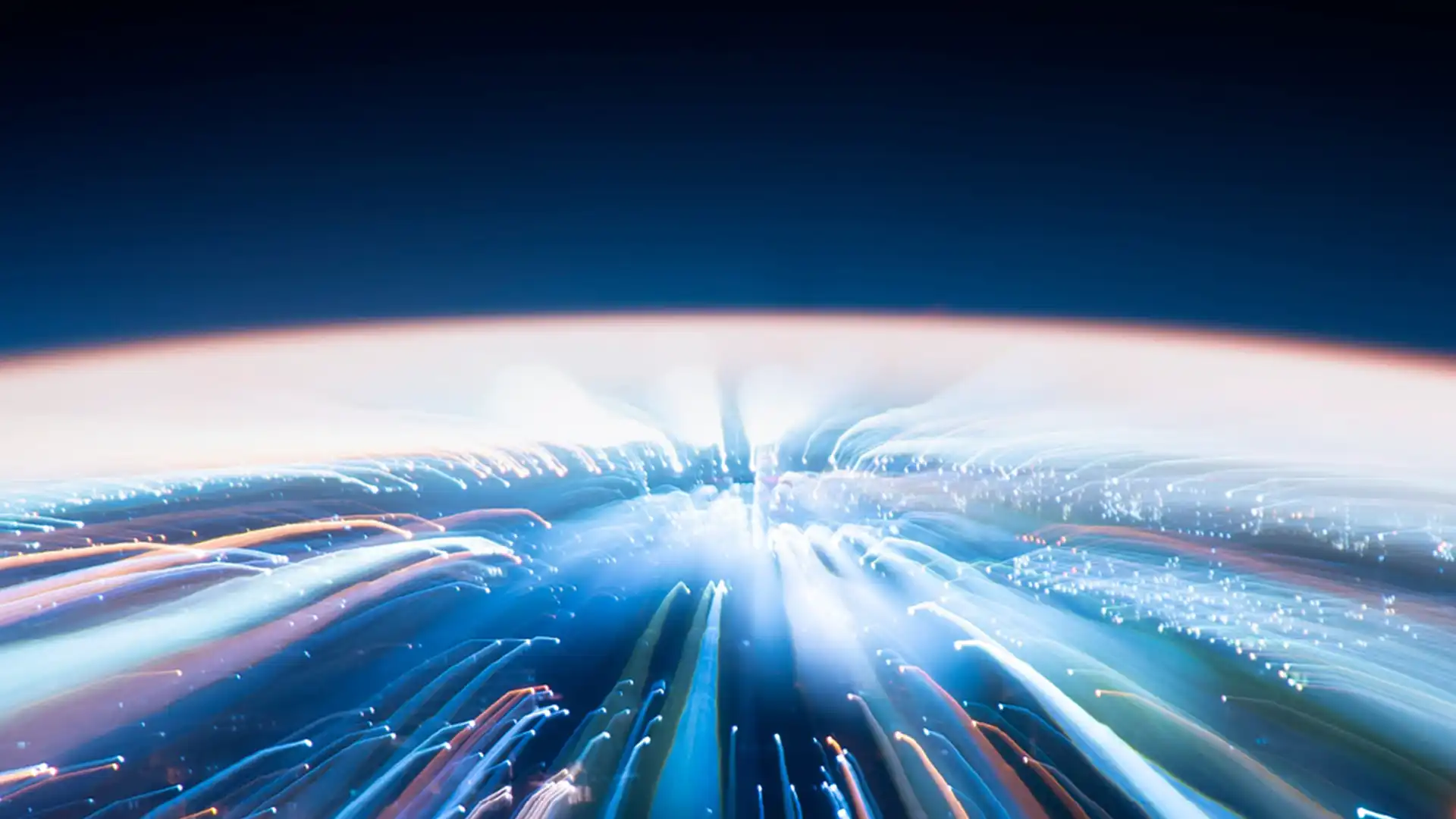 woman on tablet in front of laptop